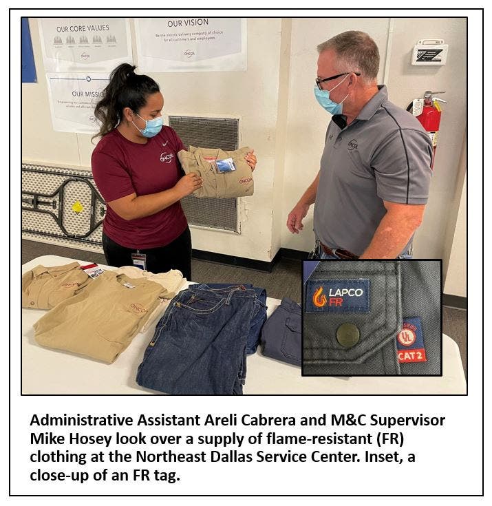Oncor employees look over FR clothing Oncor employees look over FR clothing