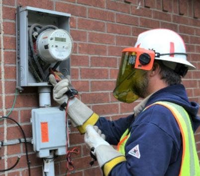Person in the field working on meter Person in the field working on meter